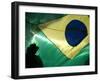 A Vendor Walks Behind a Big Brazilian Flag-null-Framed Premium Photographic Print