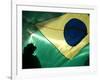 A Vendor Walks Behind a Big Brazilian Flag-null-Framed Photographic Print