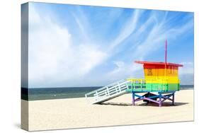A Vibrant Photo of a Lifeguard Tower in the Colors of the Pride Flag-karandaev-Stretched Canvas