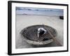 A Vietnamese Fisherman Does Repairs on His Basket Boat on a Beach-null-Framed Photographic Print