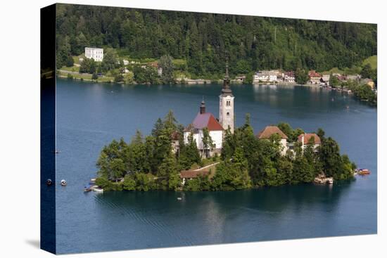 A view from above of Lake Bled and the Assumption of Mary Pilgrimage Church, Slovenia, Europe-Sergio Pitamitz-Stretched Canvas