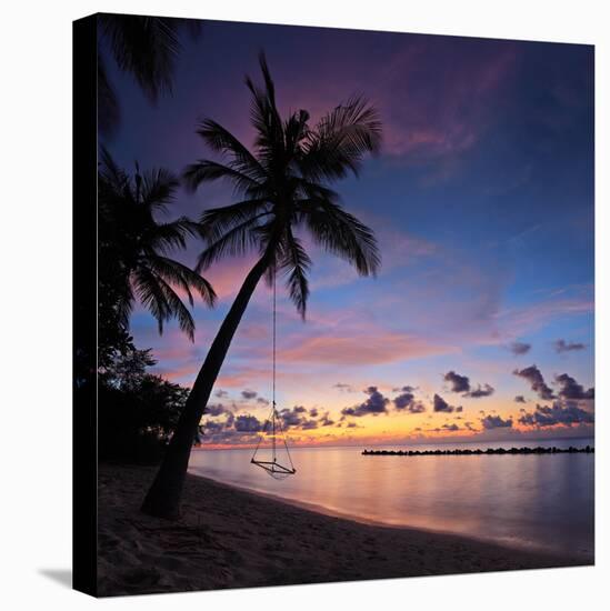 A View of a Beach with Palm Trees and Swing at Sunset, Kuredu Island, Maldives, Lhaviyani Atoll-Ljsphotography-Stretched Canvas