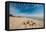 A View of a Deserted Beach with Sand Castle in England-Will Wilkinson-Framed Stretched Canvas