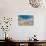 A View of a Deserted Beach with Sand Castle in England-Will Wilkinson-Photographic Print displayed on a wall