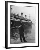 A View of a Sailor Looking at a Ship Docked in the City of Genoa-Carl Mydans-Framed Premium Photographic Print