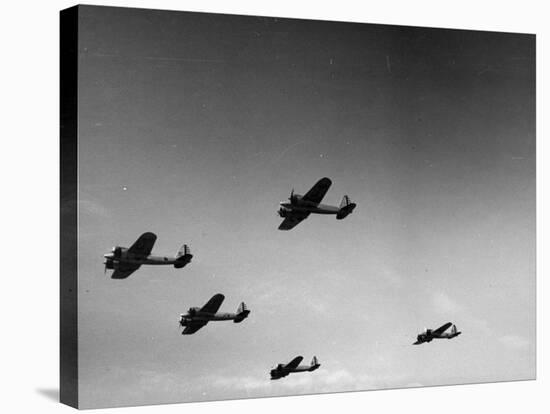 A View of Bomber Planes Being Used During US Army Maneuvers-John Phillips-Stretched Canvas