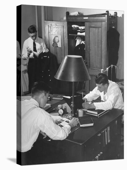 A View of Cadets at the Annapolis Naval Academy Studying in their Dorm Room-David Scherman-Stretched Canvas