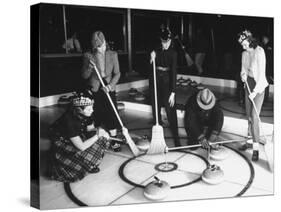 A View of People Playing a New Game Called Curling-George Strock-Stretched Canvas