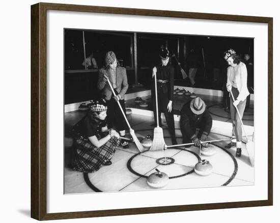 A View of People Playing a New Game Called Curling-George Strock-Framed Premium Photographic Print