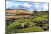 A view of the shore and hills of Portuairk, Sanna Bay along the Ardnamurchan coast in the Scottish -Peter Watson-Mounted Photographic Print