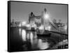 A View of Tower Bridge on the River Thames Illuminated at Night in London, April 1987-null-Framed Stretched Canvas