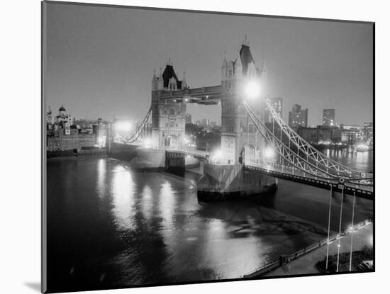 A View of Tower Bridge on the River Thames Illuminated at Night in London, April 1987-null-Mounted Premium Photographic Print