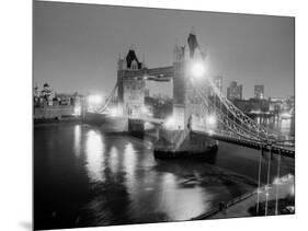 A View of Tower Bridge on the River Thames Illuminated at Night in London, April 1987-null-Mounted Photographic Print
