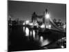 A View of Tower Bridge on the River Thames Illuminated at Night in London, April 1987-null-Mounted Photographic Print