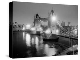 A View of Tower Bridge on the River Thames Illuminated at Night in London, April 1987-null-Stretched Canvas