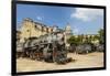 A Vintage Steam Train in a Restoration Yard with Dome of Former Parliament Building in Background-Sean Cooper-Framed Premium Photographic Print