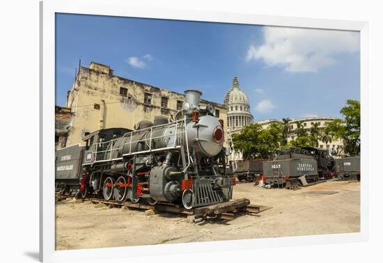 A Vintage Steam Train in a Restoration Yard with Dome of Former Parliament Building in Background-Sean Cooper-Framed Photographic Print