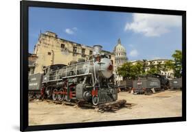 A Vintage Steam Train in a Restoration Yard with Dome of Former Parliament Building in Background-Sean Cooper-Framed Photographic Print