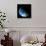 A Water Covered World in Deep Space Illuminated by a it's Parent Star-null-Art Print displayed on a wall