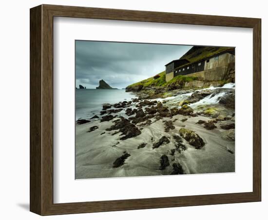 A Waterfall Cascading over the Black Sand Beach of Bour into the Sorvagsfjorour, Vagar Island, Faro-Kimberley Coole-Framed Photographic Print