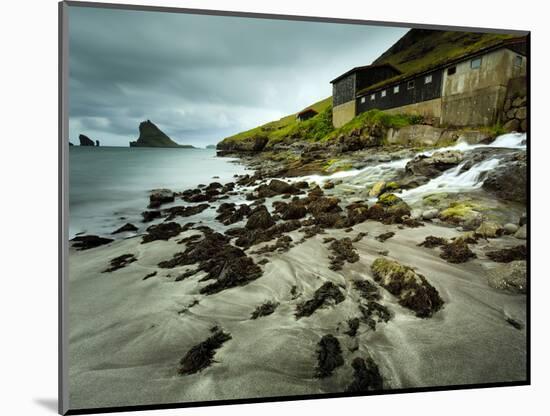 A Waterfall Cascading over the Black Sand Beach of Bour into the Sorvagsfjorour, Vagar Island, Faro-Kimberley Coole-Mounted Photographic Print