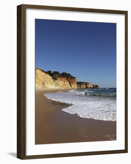 A Wave Breaks on Golden Sands Flanked by Steep Cliffs, Typical of the Atlantic Coastline Near Lagos-Stuart Forster-Framed Photographic Print