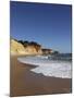 A Wave Breaks on Golden Sands Flanked by Steep Cliffs, Typical of the Atlantic Coastline Near Lagos-Stuart Forster-Mounted Photographic Print