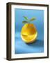 A Wet Orange with Leaves and a Slice Cut Out-null-Framed Photographic Print