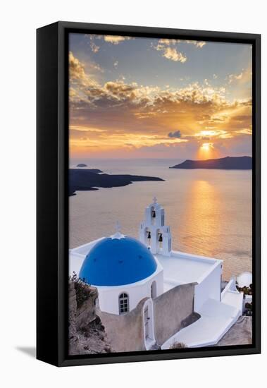 A white church with blue dome overlooking the Aegean Sea at sunset, Santorini, Cyclades-Ed Hasler-Framed Stretched Canvas