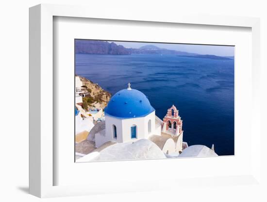 A white church with blue dome overlooking the Aegean Sea, Santorini, Cyclades-Ed Hasler-Framed Photographic Print