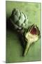 A Whole and a Half Artichoke on Green Background-Studio DHS-Mounted Photographic Print