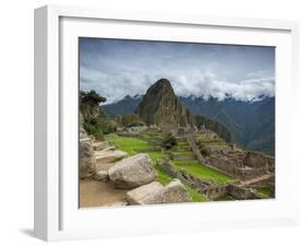 A wide angle photo of Macchu Pichu at sunrise with dramatic clouds in the distance.-Alex Saberi-Framed Premium Photographic Print