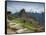 A wide angle photo of Macchu Pichu at sunrise with dramatic clouds in the distance.-Alex Saberi-Framed Stretched Canvas