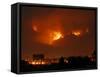 A Wildfire Can be Seen Raging in the Hills Over the Town of St. Ignatius, Montana-null-Framed Stretched Canvas