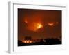 A Wildfire Can be Seen Raging in the Hills Over the Town of St. Ignatius, Montana-null-Framed Photographic Print