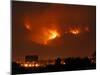 A Wildfire Can be Seen Raging in the Hills Over the Town of St. Ignatius, Montana-null-Mounted Photographic Print