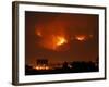 A Wildfire Can be Seen Raging in the Hills Over the Town of St. Ignatius, Montana-null-Framed Photographic Print