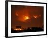 A Wildfire Can be Seen Raging in the Hills Over the Town of St. Ignatius, Montana-null-Framed Photographic Print