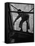 A Window Washer Cleaning the Windows-Peter Stackpole-Framed Stretched Canvas