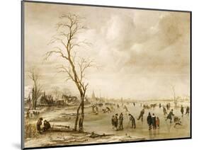 A Winter Landscape with Townsfolk Skating and Playing Kolf on a Frozen River, a Town Beyond-Aert van der Neer-Mounted Giclee Print