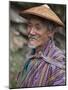 A Wizened Old Farmer Near Mongar Wears the Traditional Knee-Length National Robe Called Gho and a B-Nigel Pavitt-Mounted Photographic Print