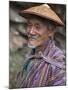 A Wizened Old Farmer Near Mongar Wears the Traditional Knee-Length National Robe Called Gho and a B-Nigel Pavitt-Mounted Photographic Print