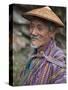 A Wizened Old Farmer Near Mongar Wears the Traditional Knee-Length National Robe Called Gho and a B-Nigel Pavitt-Stretched Canvas