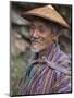 A Wizened Old Farmer Near Mongar Wears the Traditional Knee-Length National Robe Called Gho and a B-Nigel Pavitt-Mounted Photographic Print