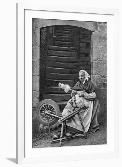 A Woman at a Spinning Wheel, Dinan, Brittany, France, C1922-null-Framed Giclee Print