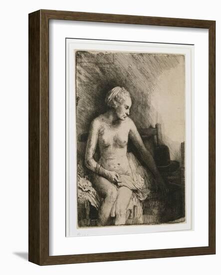 A Woman at the Bath with a Hat Beside Her, 1658-Rembrandt van Rijn-Framed Giclee Print