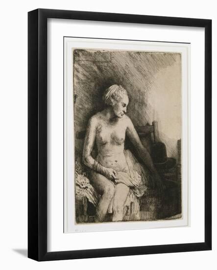 A Woman at the Bath with a Hat Beside Her, 1658-Rembrandt van Rijn-Framed Giclee Print