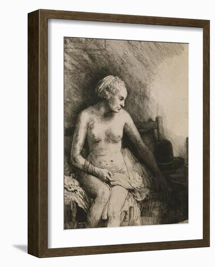 A Woman at the Bath with a Hat Beside Her-Rembrandt van Rijn-Framed Giclee Print