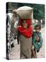 A Woman Carries Relief Supplies at Jula Village, Near Uri, India-null-Stretched Canvas