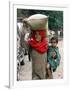 A Woman Carries Relief Supplies at Jula Village, Near Uri, India-null-Framed Photographic Print